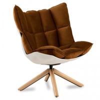 Replica della poltrona di design Husk con poggiapiedi della magnifica designer Patricia Urquiola