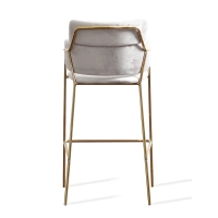 Sgabello alto imbottito con gambe dorate